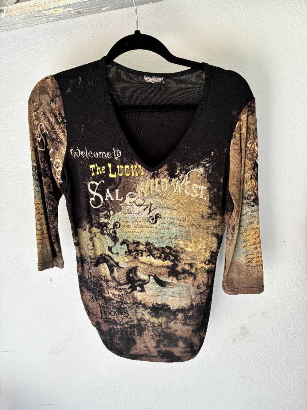 woman's western-themed shirt
